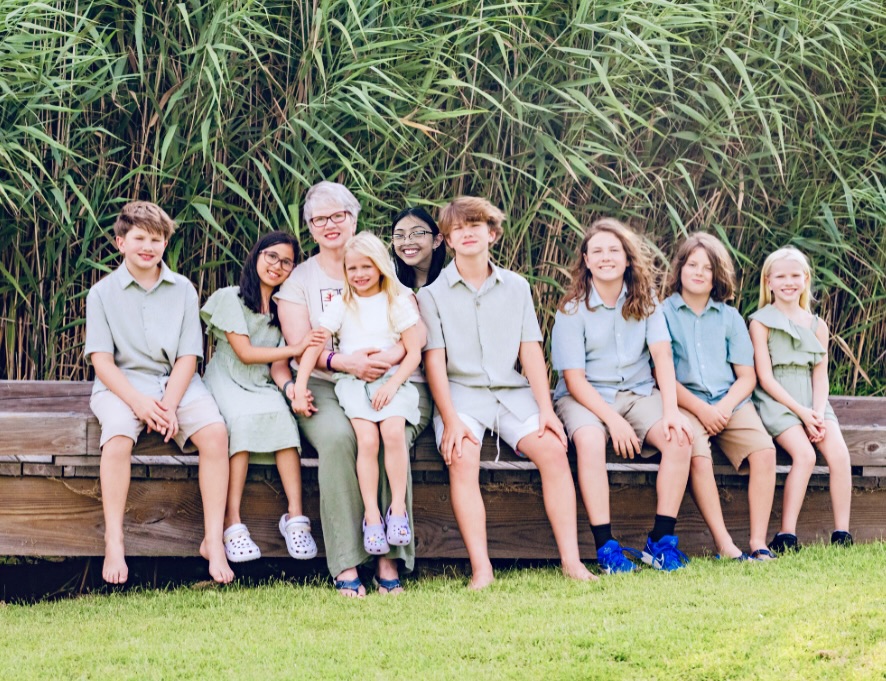 Carolyn & grandchildren Summer 2025 Carolyn and her grandchildren are at the beach in North Carolina July 2025.